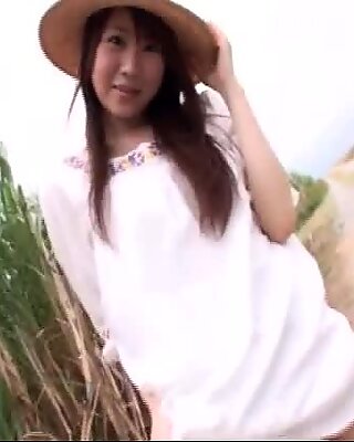 Country chick Hitomi Kitamura plays twister and gets horny outdoors